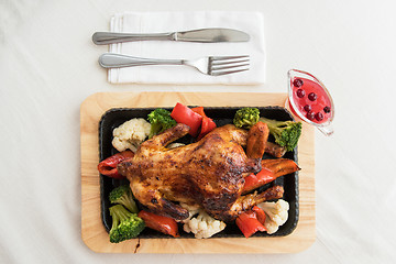 Image showing Roasted chicken with vegetables.