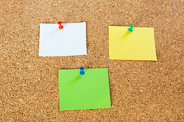 Image showing Thumbtack pins and notepaper on pinboard