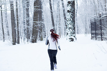 Image showing Sports women in winter park