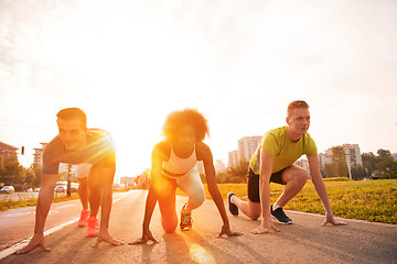 Image showing multiethnic group of people on the jogging