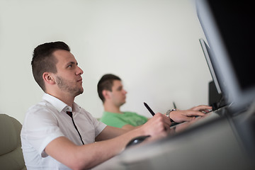 Image showing a group of graphic designers at work