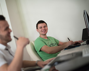 Image showing a group of graphic designers at work