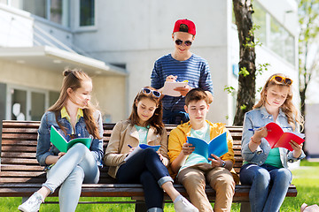 Image showing group of students with notebooks at school yard