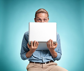 Image showing Sad Young Man Working On Laptop