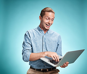 Image showing Sad Young Man Working On Laptop