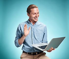 Image showing Sad Young Man Working On Laptop
