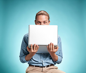 Image showing Sad Young Man Working On Laptop