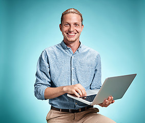 Image showing Sad Young Man Working On Laptop