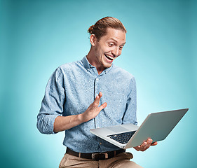 Image showing Sad Young Man Working On Laptop