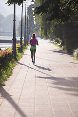 Image showing african american woman jogging in the city