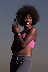 Image showing african american woman jogging in nature