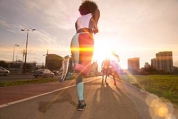 Image showing multiethnic group of people on the jogging