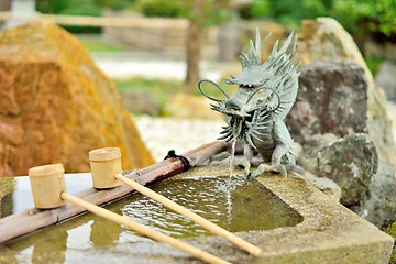 Image showing Japanese washbasin, tsukubai, with a dragon fountain