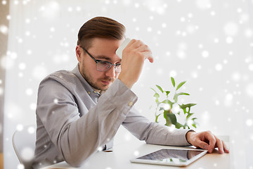 Image showing businessman with smartphoneat home office