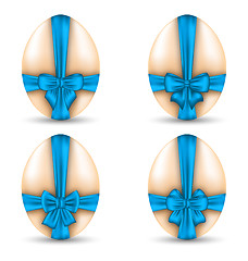 Image showing Easter set celebration eggs wrapping blue bows with shadows isol