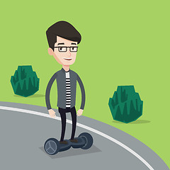 Image showing Man riding on self-balancing electric scooter.