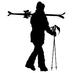 Image showing Mountain skier speeding down slope. sport silhouette