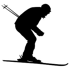 Image showing Mountain skier speeding down slope. sport silhouette