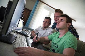 Image showing a group of graphic designers at work