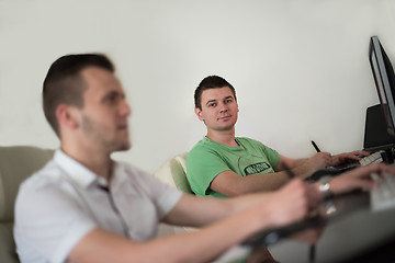 Image showing a group of graphic designers at work