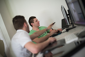 Image showing a group of graphic designers at work