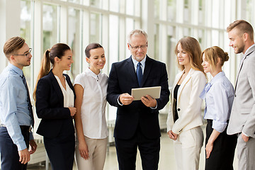 Image showing business people with tablet pc computer at office