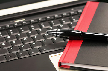 Image showing laptop and notebook