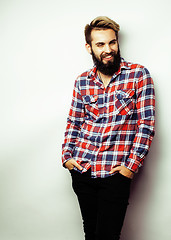 Image showing portrait of young bearded hipster guy smiling on white background close up, brutal man, lifestyle people concept