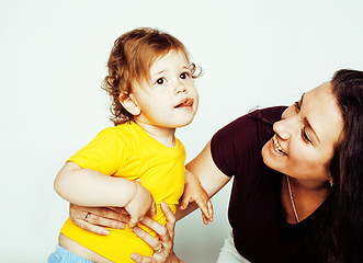 Image showing bright picture of hugging mother and daughter happy together, smiling stylish family. lifestyle people concept