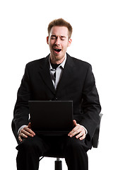 Image showing Yawning businessman