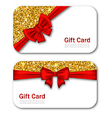 Image showing Gift Cards with Red Bow Ribbon and Golden Sparkles