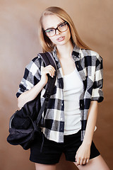 Image showing young happy smiling hipster blond girl with backpack ready to school, teenage lifestyle people concept