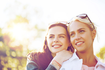 Image showing happy young women or teenage girls outdoors