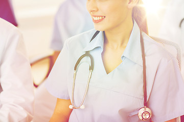 Image showing close up of doctor with stethoscope at seminar