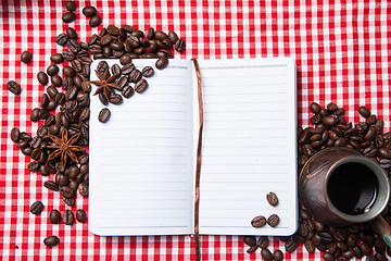 Image showing Blank paper, coffe bean and coffee cup on wood