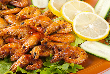 Image showing Fried Shrimps with Salad Leaves, Lemon