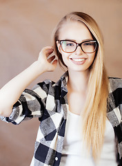 Image showing young happy smiling hipster blond girl with backpack ready to school, teenage lifestyle people concept