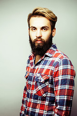 Image showing portrait of young bearded hipster guy smiling on white background close up, brutal man, lifestyle people concept