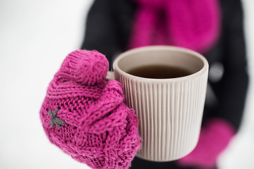 Image showing close up of woman with tea mug outdoors in winter