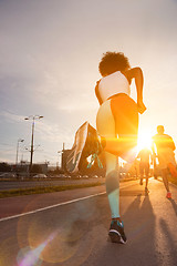 Image showing multiethnic group of people on the jogging