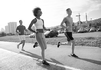 Image showing multiethnic group of people on the jogging