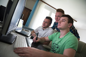 Image showing a group of graphic designers at work