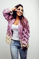 Image showing young happy smiling latin american teenage girl emotional posing on white background, lifestyle people concept