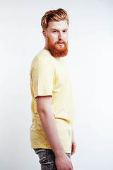 Image showing young handsome hipster bearded guy looking brutal isolated on white background, lifestyle people concept