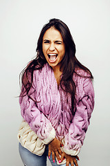 Image showing young happy smiling latin american teenage girl emotional posing on white background, lifestyle people concept