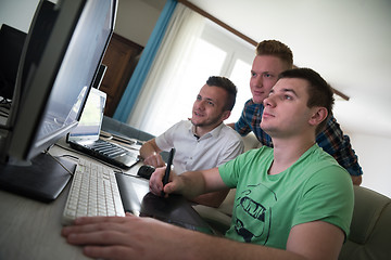 Image showing a group of graphic designers at work