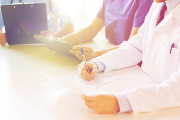 Image showing close up of happy doctors at seminar or hospital