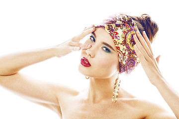 Image showing young pretty modern girl with bright shawl on head emotional posing isolated on white background, asian people ethnicity