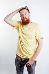 Image showing young handsome hipster bearded guy looking brutal isolated on white background, lifestyle people concept