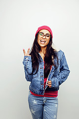 Image showing young happy smiling latin american teenage girl emotional posing on white background, lifestyle people concept